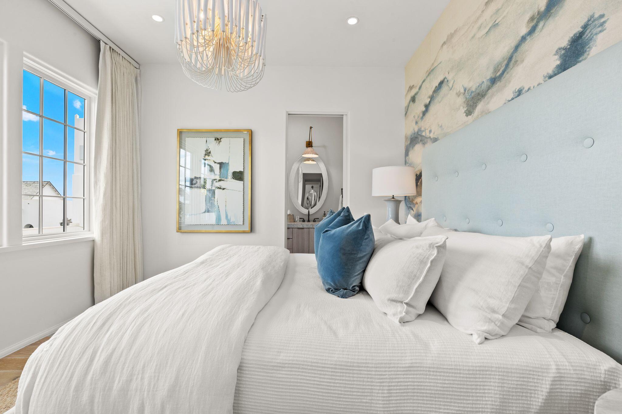 89 Kaiya Avenue Inlet Beach, FL 32461 - Photo 58 of 82 a bedroom with a large bed and a window