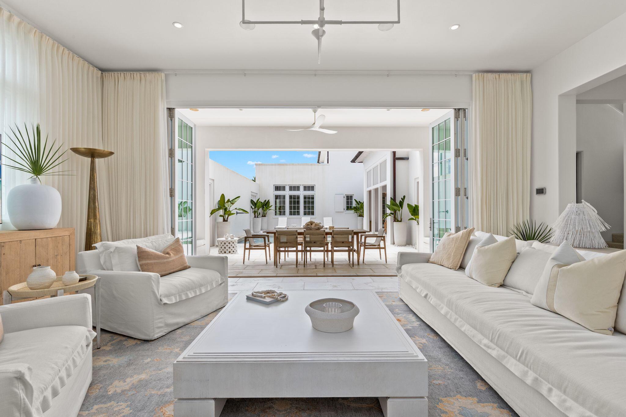 89 Kaiya Avenue Inlet Beach, FL 32461 - Photo 6 of 82 a living room with furniture and a large mirror