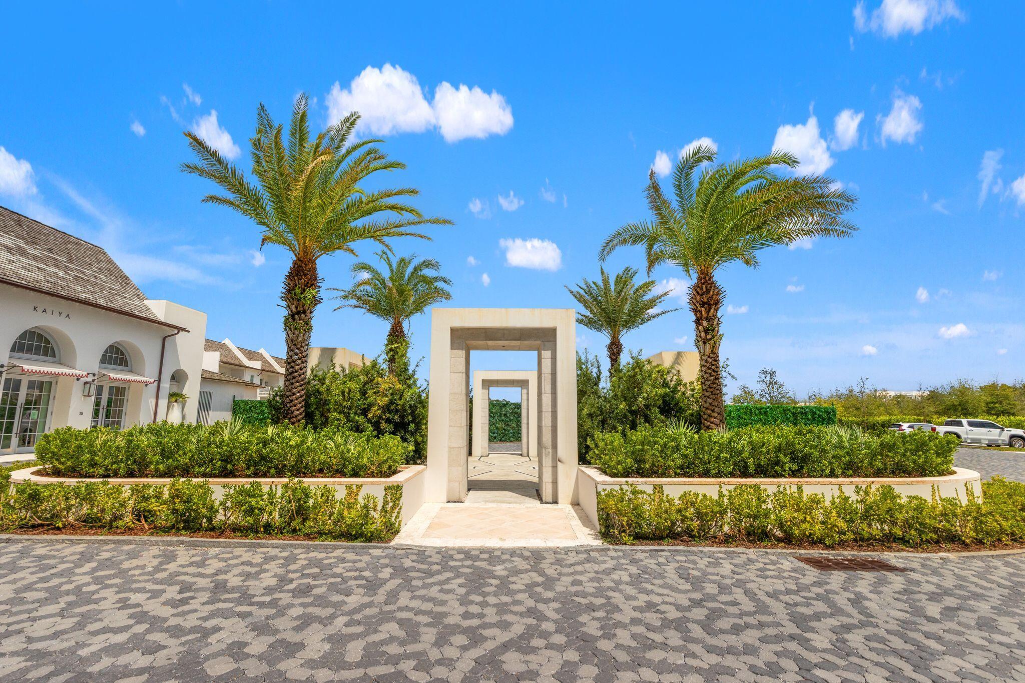 89 Kaiya Avenue Inlet Beach, FL 32461 - Photo 70 of 82 a view of a house with a flower garden