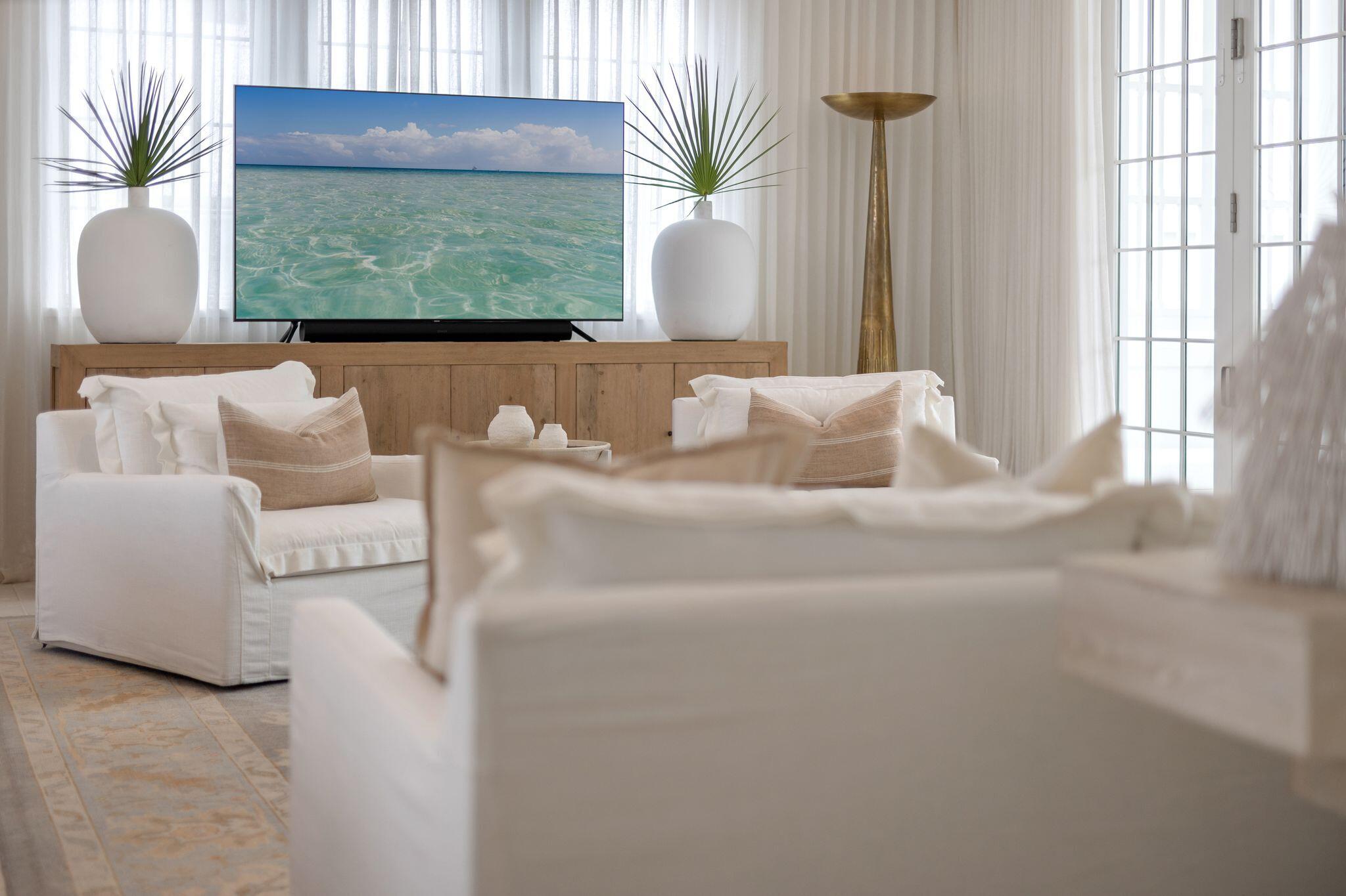 89 Kaiya Avenue Inlet Beach, FL 32461 - Photo 8 of 82 a living room with a couch and a large window
