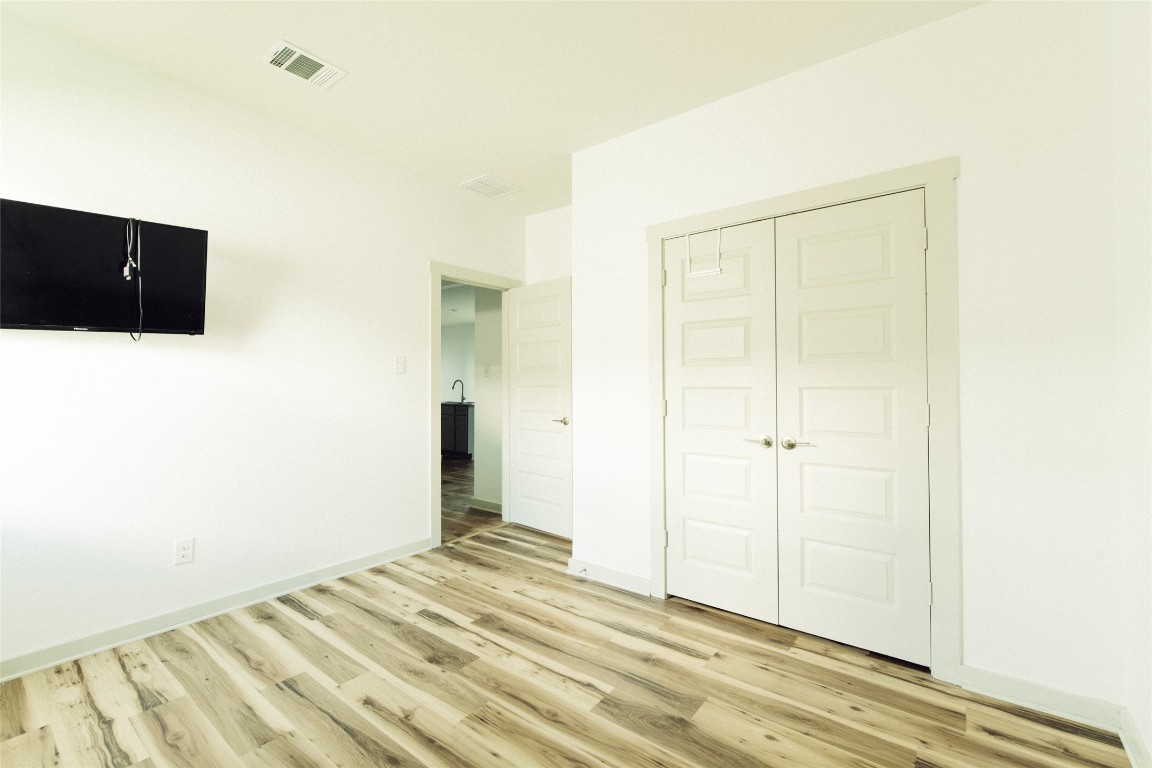 324 Millbrook Boulevard San Marcos, TX 78666 - Photo 12 of 29 a view of a livingroom with wooden floor