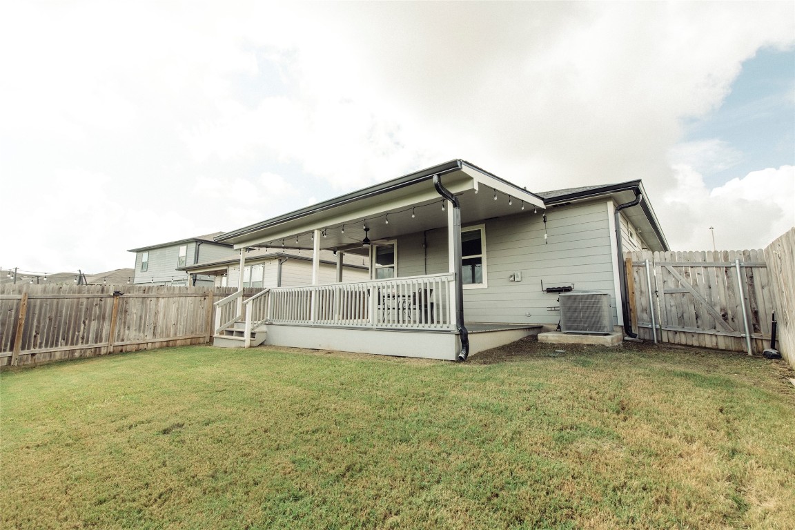 324 Millbrook Boulevard San Marcos, TX 78666 - Photo 25 of 29 a big house with a small yard and wooden fence