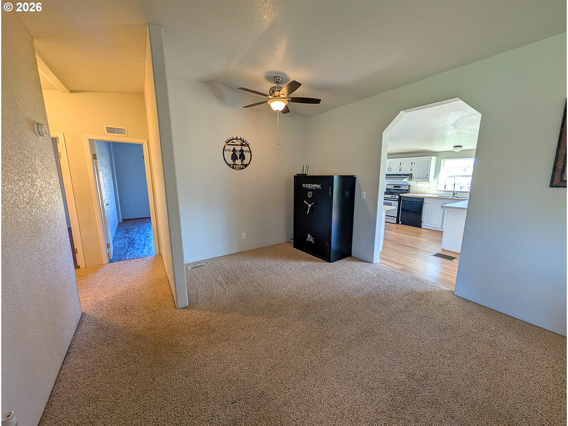 1670 Palmer Street Elgin, OR 97827 - Photo 12 of 41 a view of a livingroom with a ceiling fan and window