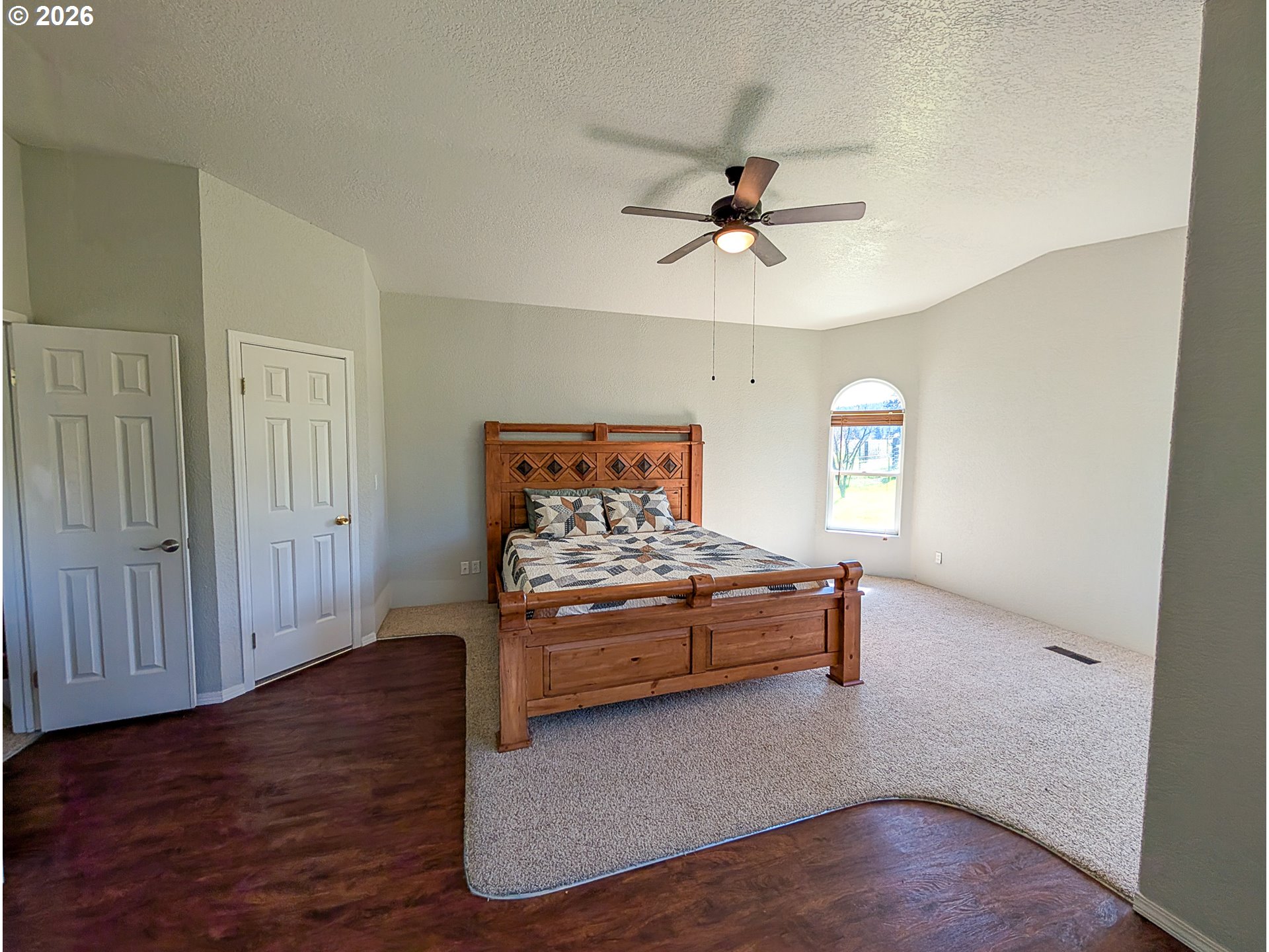 1670 Palmer Street Elgin, OR 97827 - Photo 20 of 41 a bedroom with a bed and a window