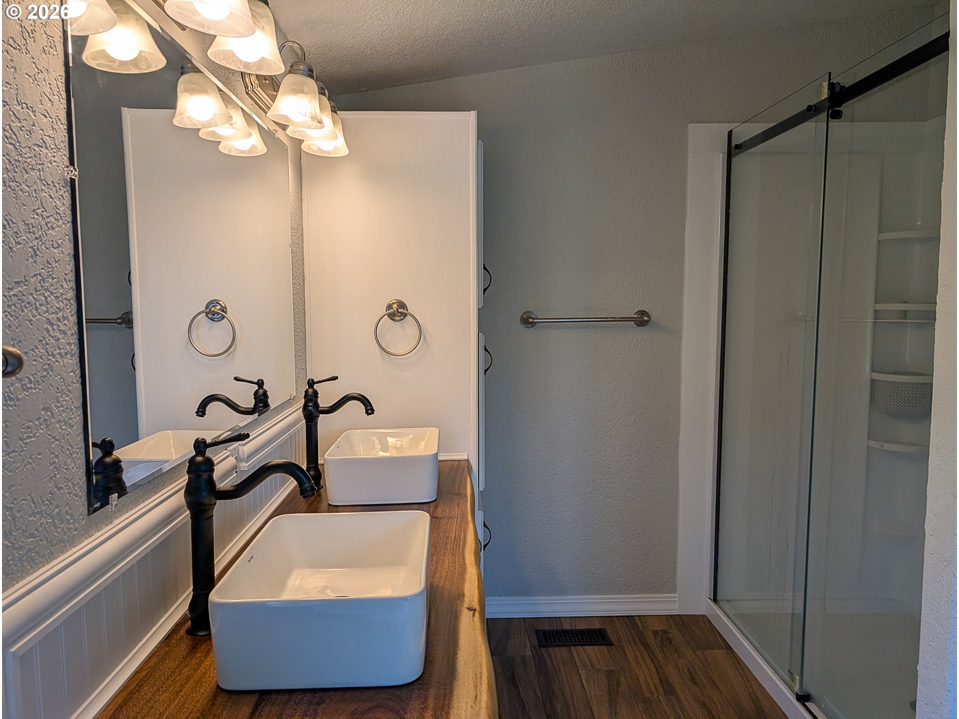 1670 Palmer Street Elgin, OR 97827 - Photo 24 of 41 a bathroom with a tub shower and sink