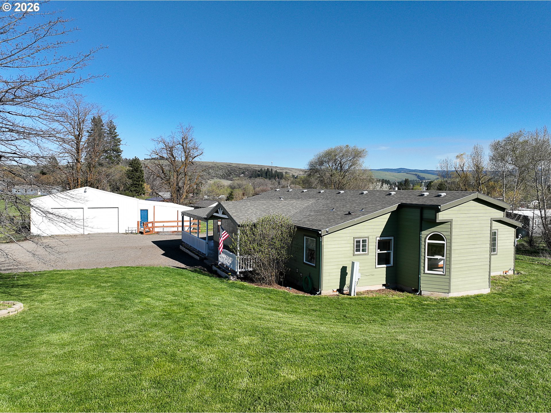 1670 Palmer Street Elgin, OR 97827 - Photo 3 of 41 a view of a house with a yard