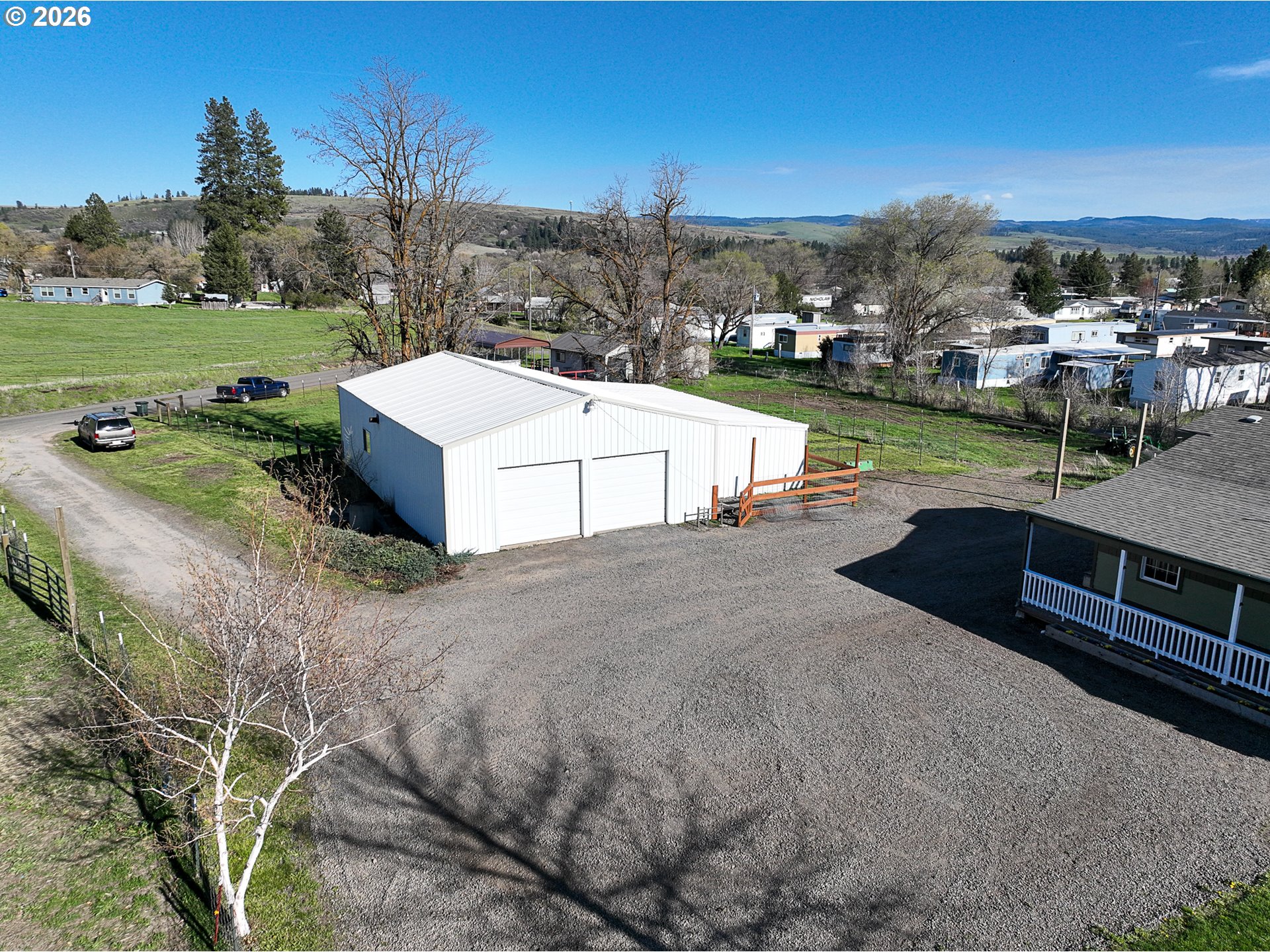 1670 Palmer Street Elgin, OR 97827 - Photo 31 of 41 a view of a house with a yard