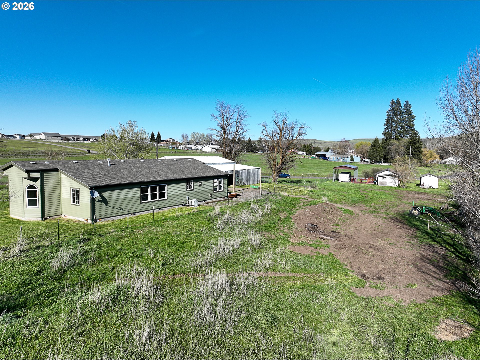 1670 Palmer Street Elgin, OR 97827 - Photo 38 of 41 a view of a house with a yard