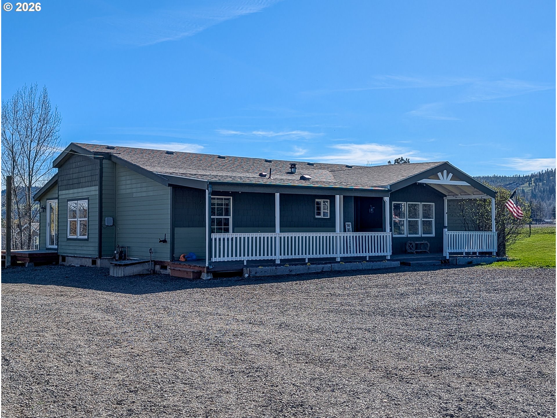 1670 Palmer Street Elgin, OR 97827 - Photo 8 of 41 a front view of a house with a yard
