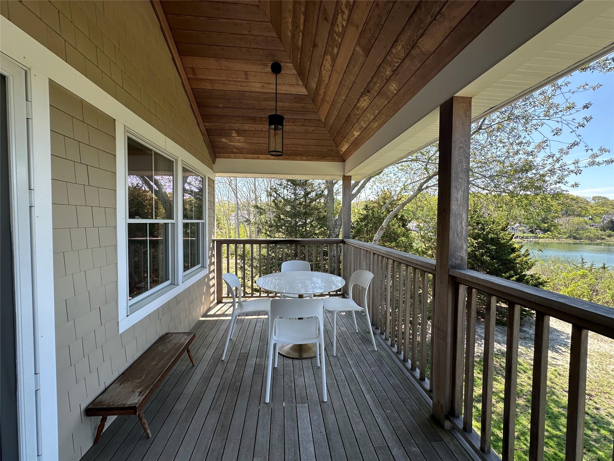 1854 North Bayview Road Southold, NY 11971 - Photo 5 of 20 a view of a balcony with chairs