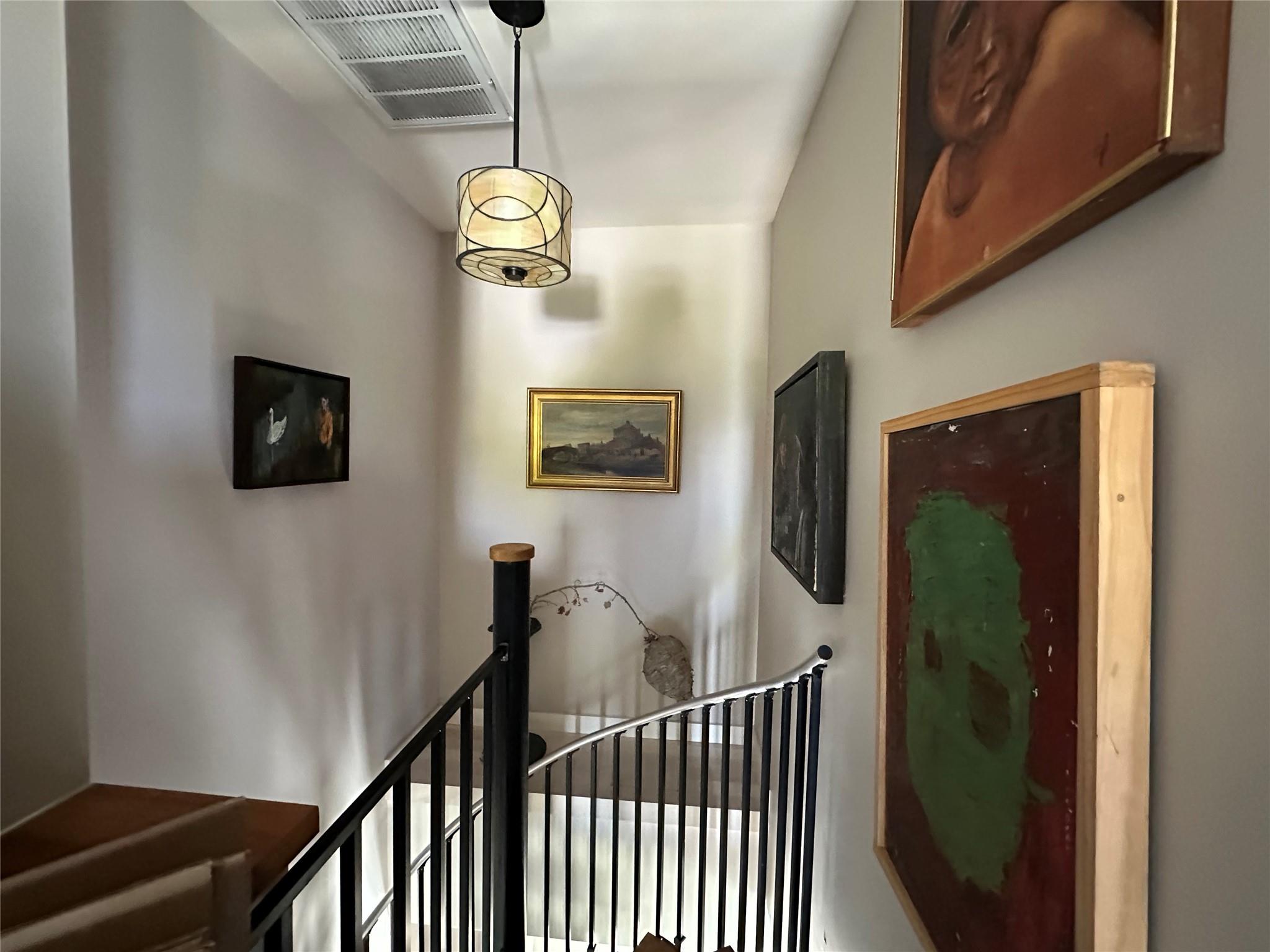 1854 North Bayview Road Southold, NY 11971 - Photo 10 of 20 a view of a hallway with wooden floor and stairs