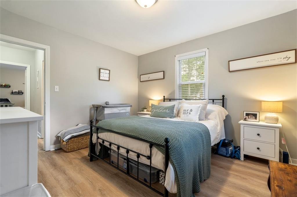 694 Oak Street Crescent, PA 15046 - Photo 14 of 19 a bedroom with a bed and a night stand