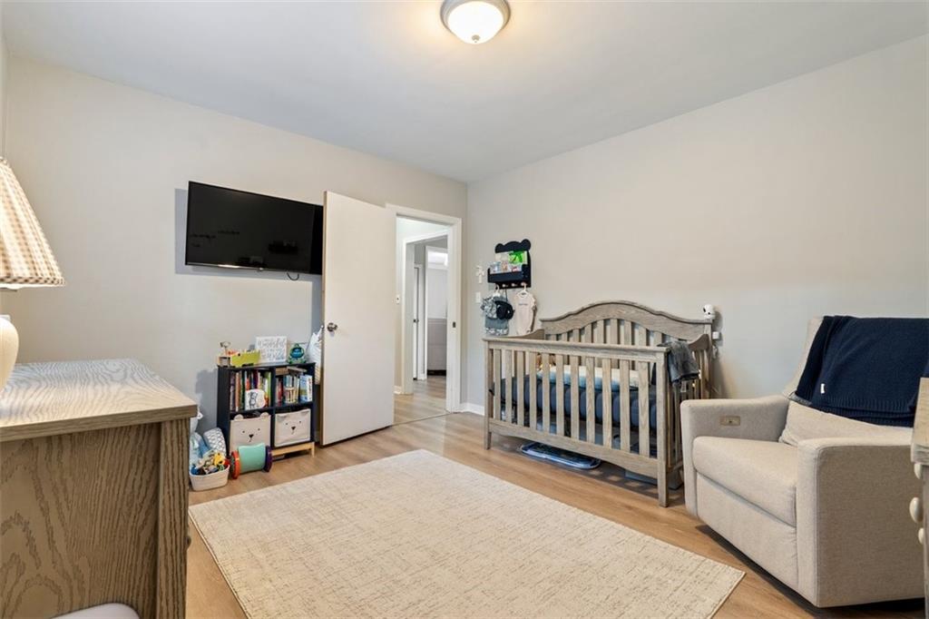 694 Oak Street Crescent, PA 15046 - Photo 15 of 19 a living room with furniture and a flat screen tv