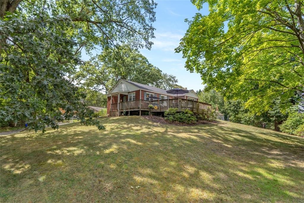 694 Oak Street Crescent, PA 15046 - Photo 3 of 19 a front view of a house with a yard
