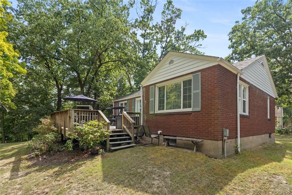 694 Oak Street Crescent, PA 15046 - Photo 4 of 19 a view of a house with a yard