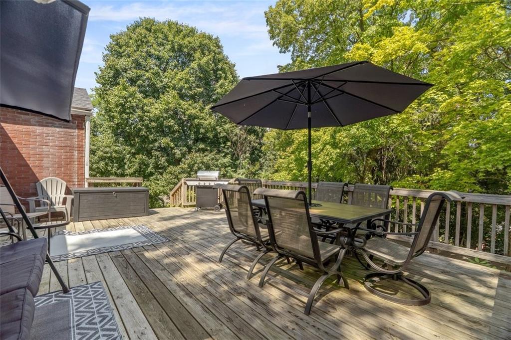 694 Oak Street Crescent, PA 15046 - Photo 6 of 19 a view of deck with furniture and umbrella