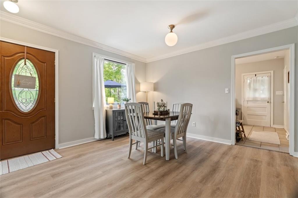 694 Oak Street Crescent, PA 15046 - Photo 10 of 19 a view of a dining room with furniture and a window