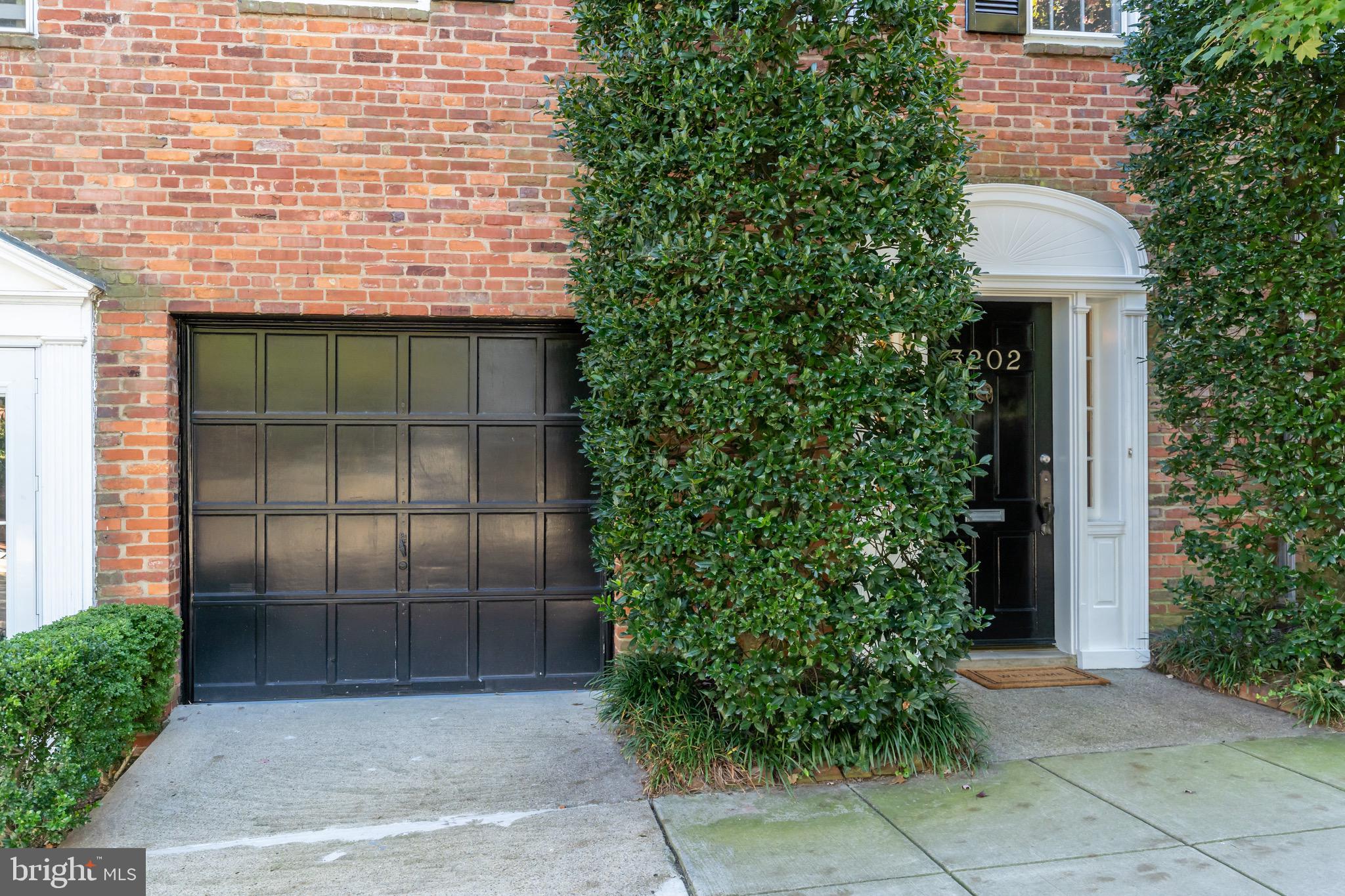 3202 Reservoir Road Northwest Washington, DC 20007 - Photo 26 of 27 Facade with One Car Attached Garage