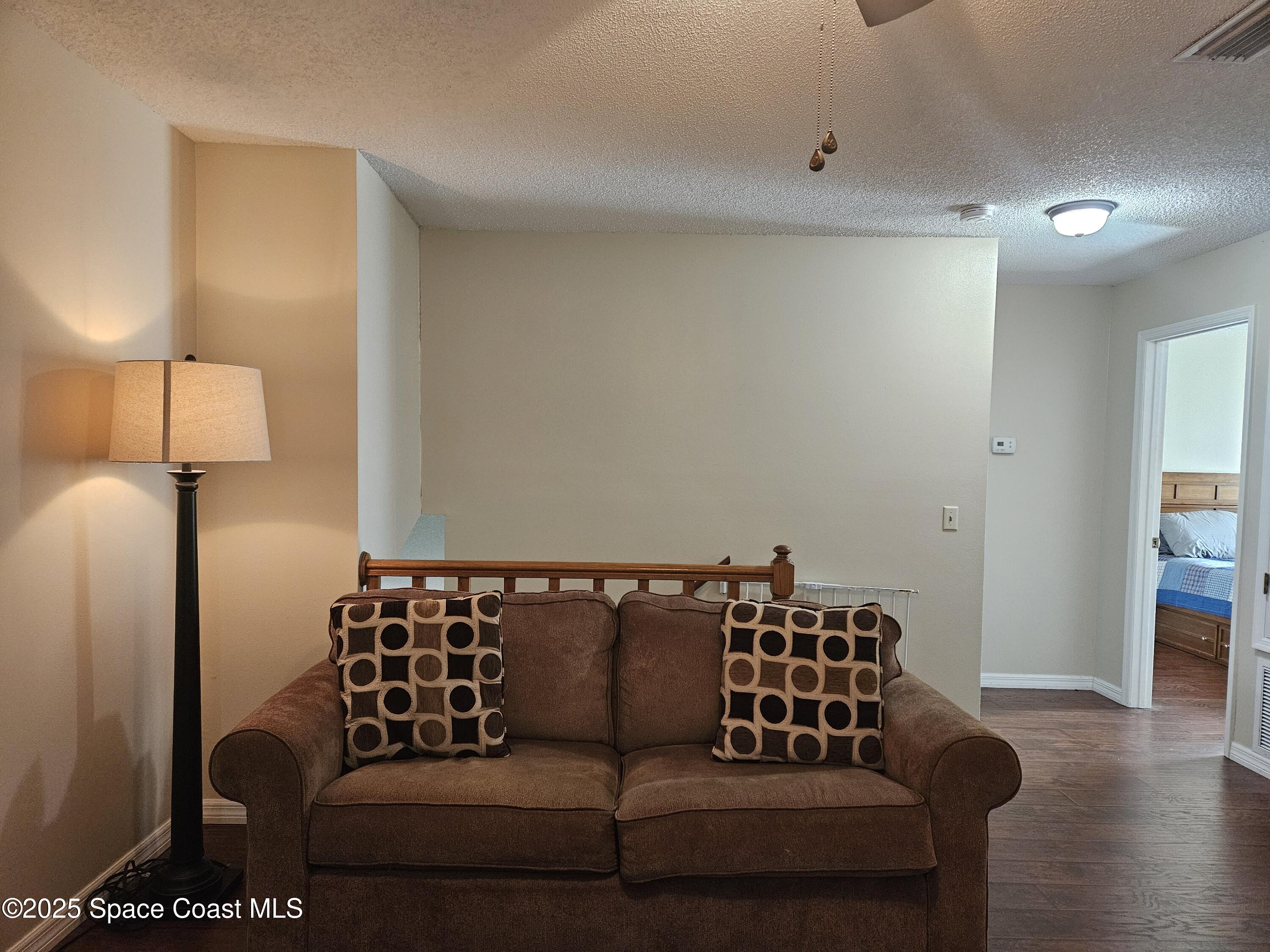 813 Pine Shadows Avenue Rockledge, FL 32955 - Photo 20 of 32 a living room with furniture