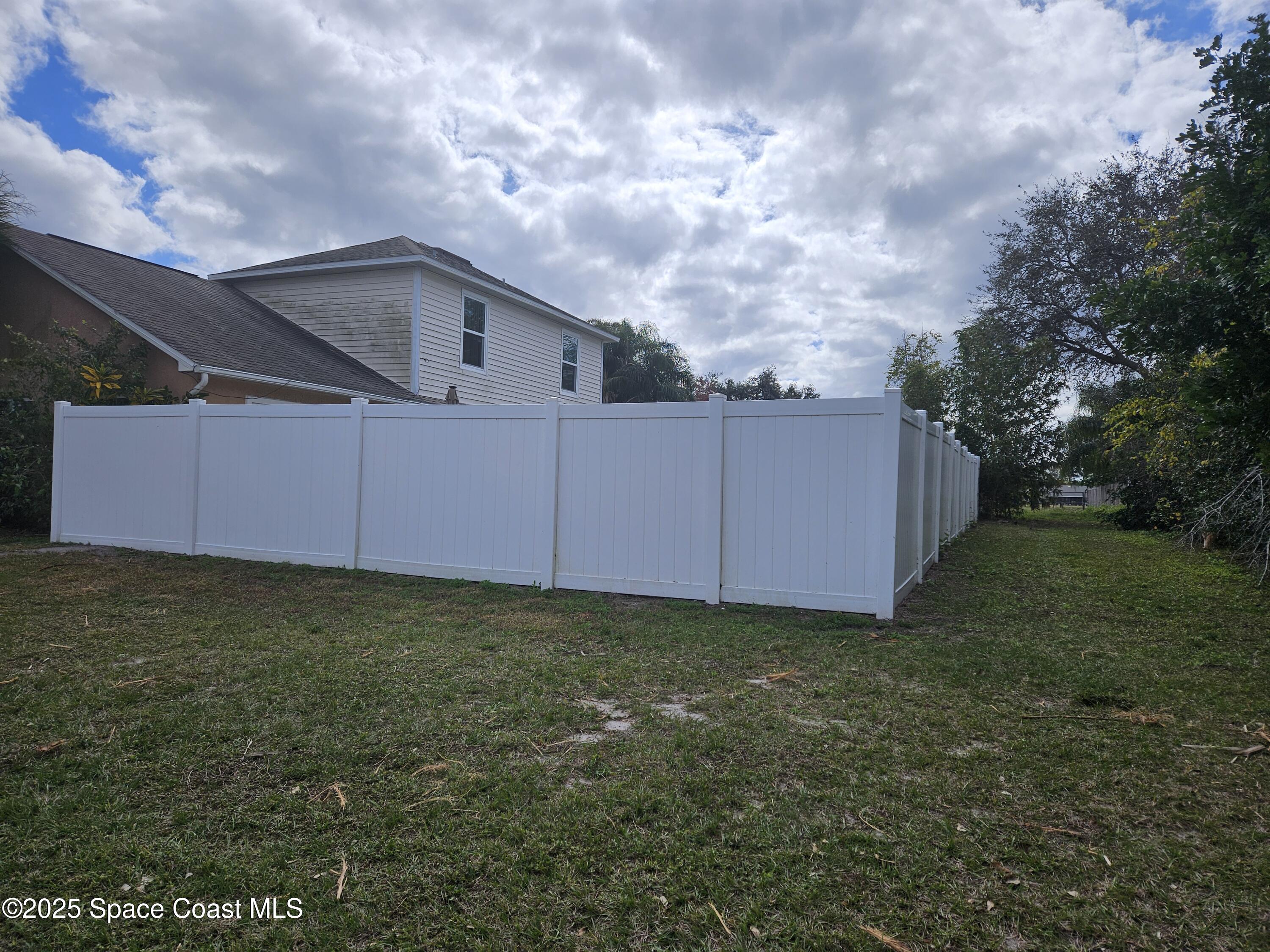 813 Pine Shadows Avenue Rockledge, FL 32955 - Photo 4 of 32 a view of a backyard