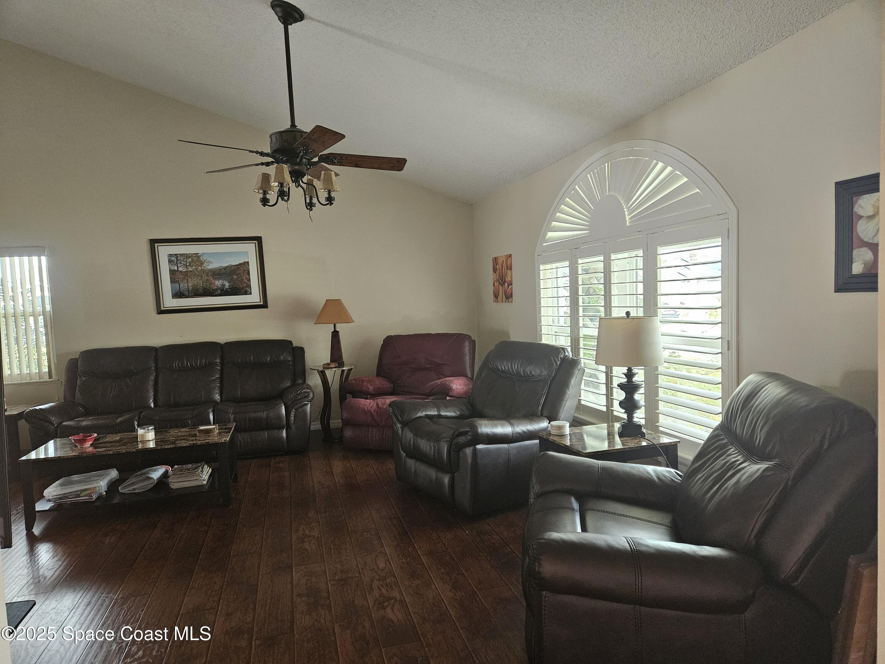 813 Pine Shadows Avenue Rockledge, FL 32955 - Photo 8 of 32 a living room with furniture