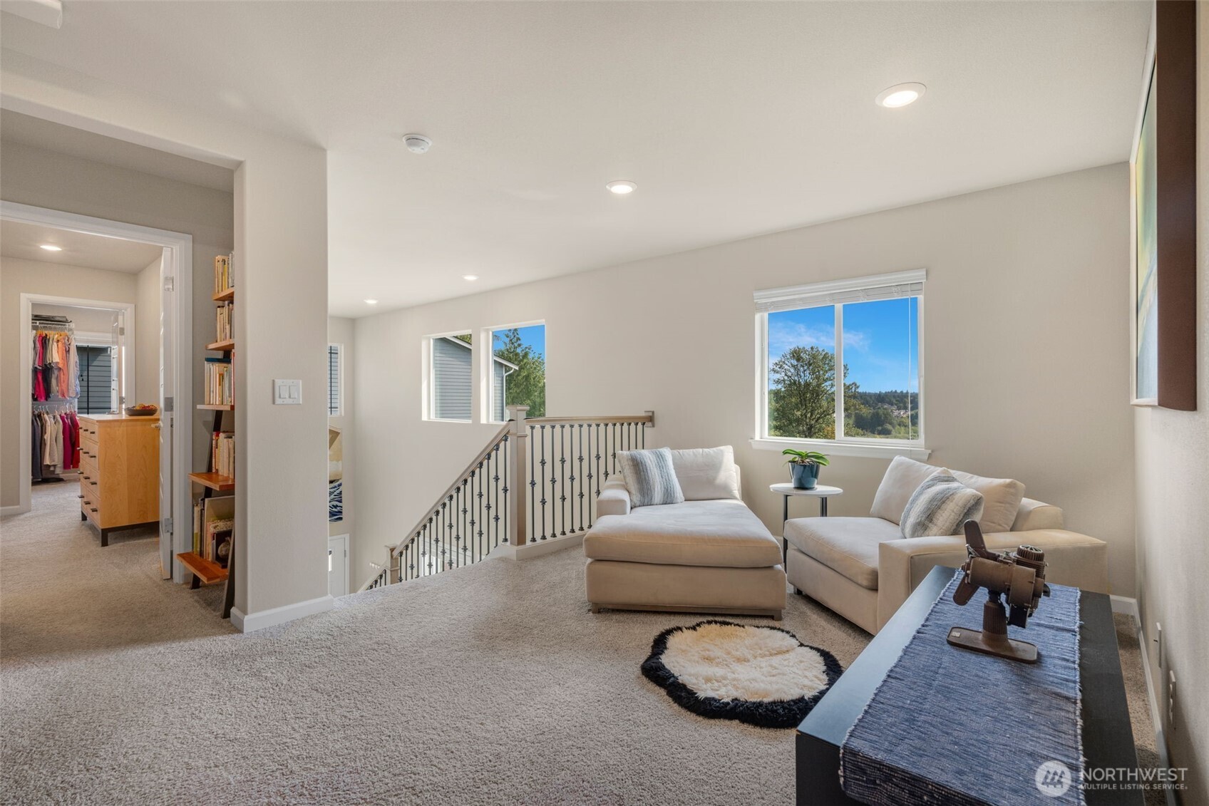 216 178th Street Southeast Bothell, WA 98012 - Photo 22 of 40 a living room with furniture and a large window