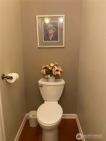 a bathroom with a toilet and a sink