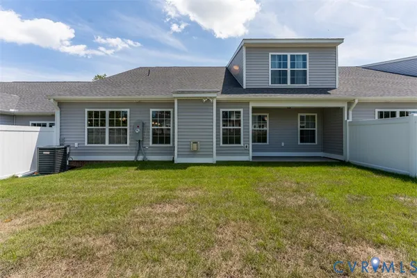front view of a house with a garden