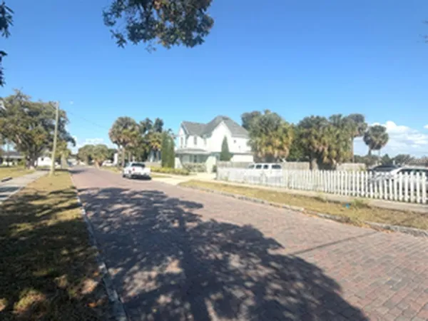 a view of road and trees
