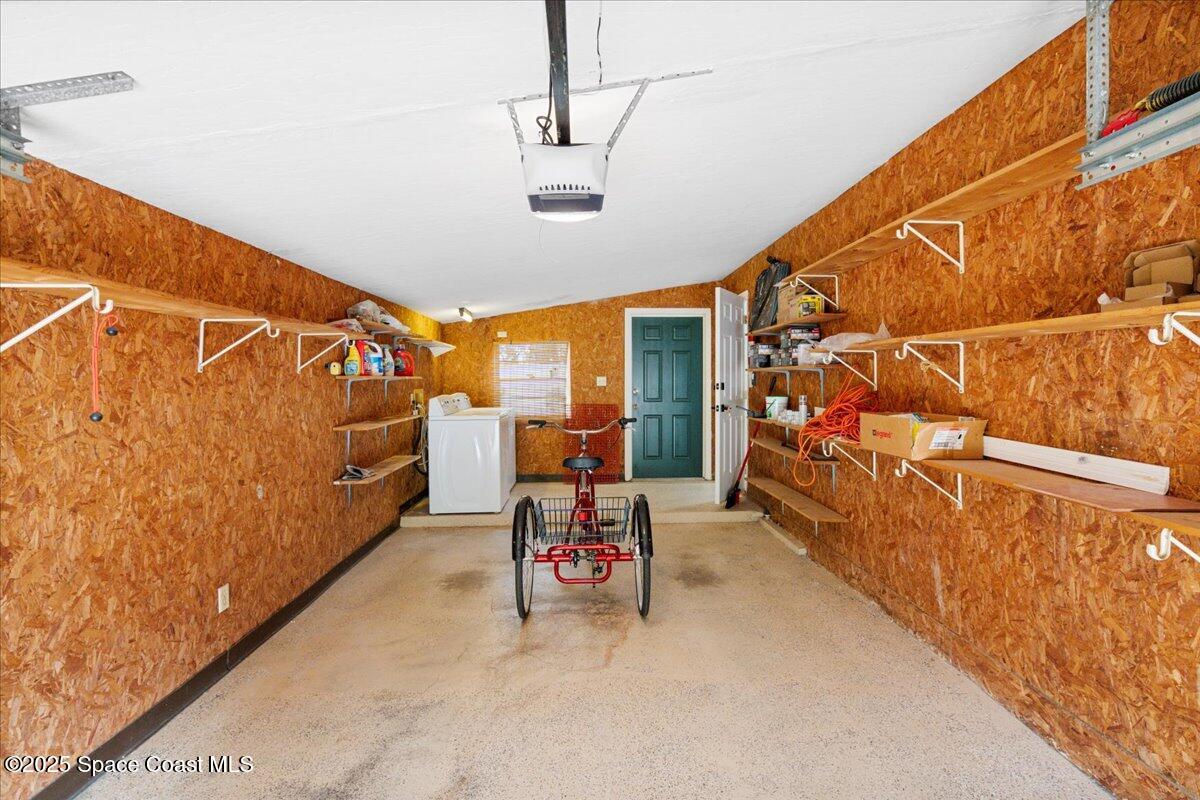 2175 Barracuda Avenue Melbourne Beach, FL 32951 - Photo 35 of 49 a backyard of a house with table and chairs