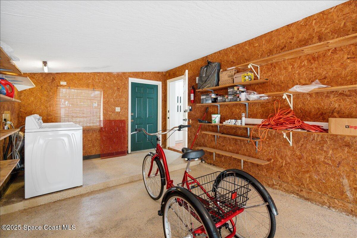 2175 Barracuda Avenue Melbourne Beach, FL 32951 - Photo 36 of 49 a view of a room with washer and dryer