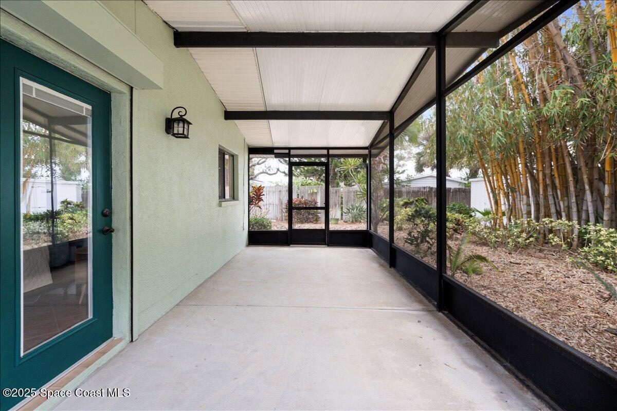 2175 Barracuda Avenue Melbourne Beach, FL 32951 - Photo 37 of 49 a view of porch with large windows