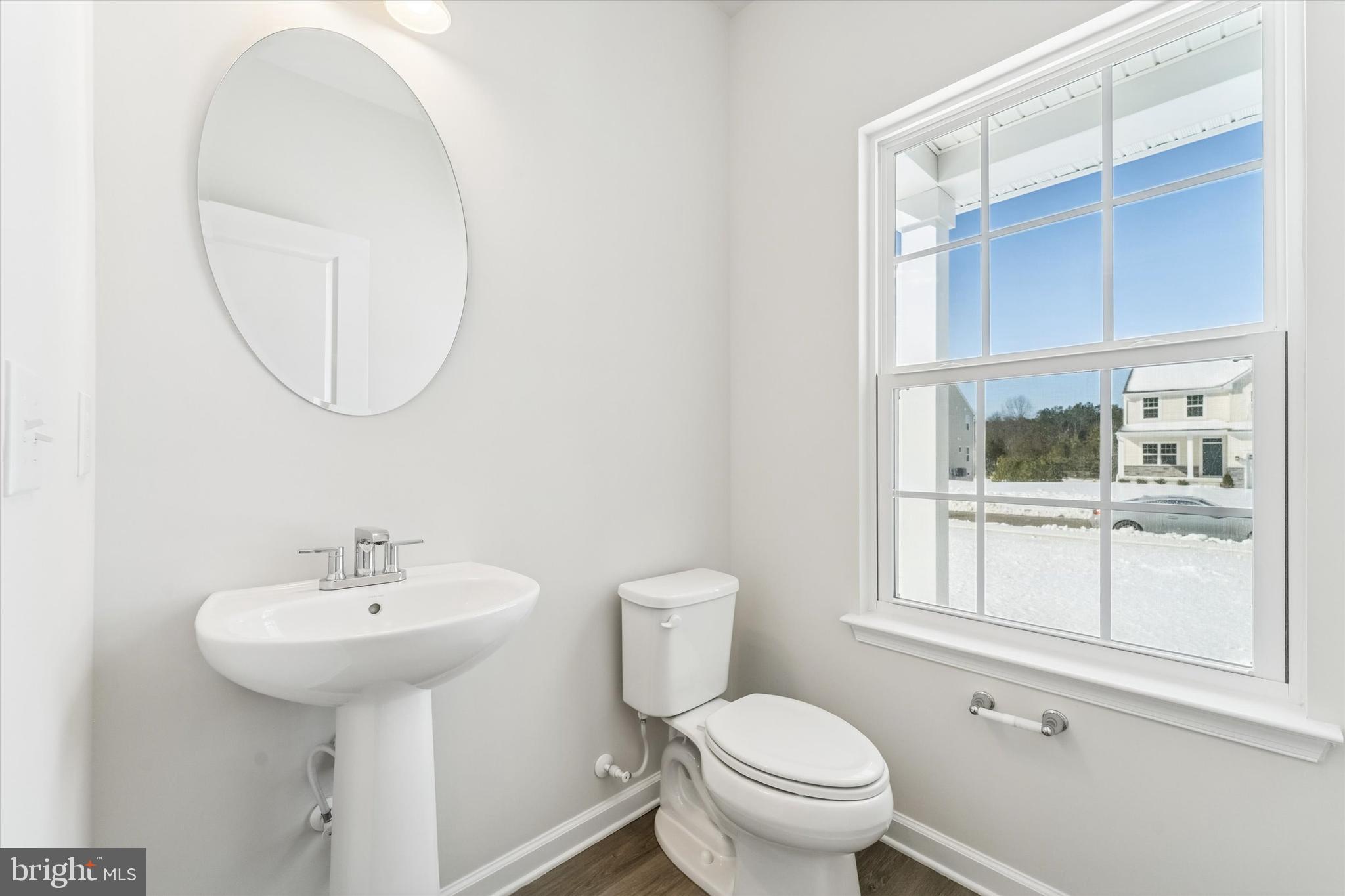 56 Mockernut Road Williamstown, NJ 08094 - Photo 12 of 29 a bathroom with a toilet a sink and a window