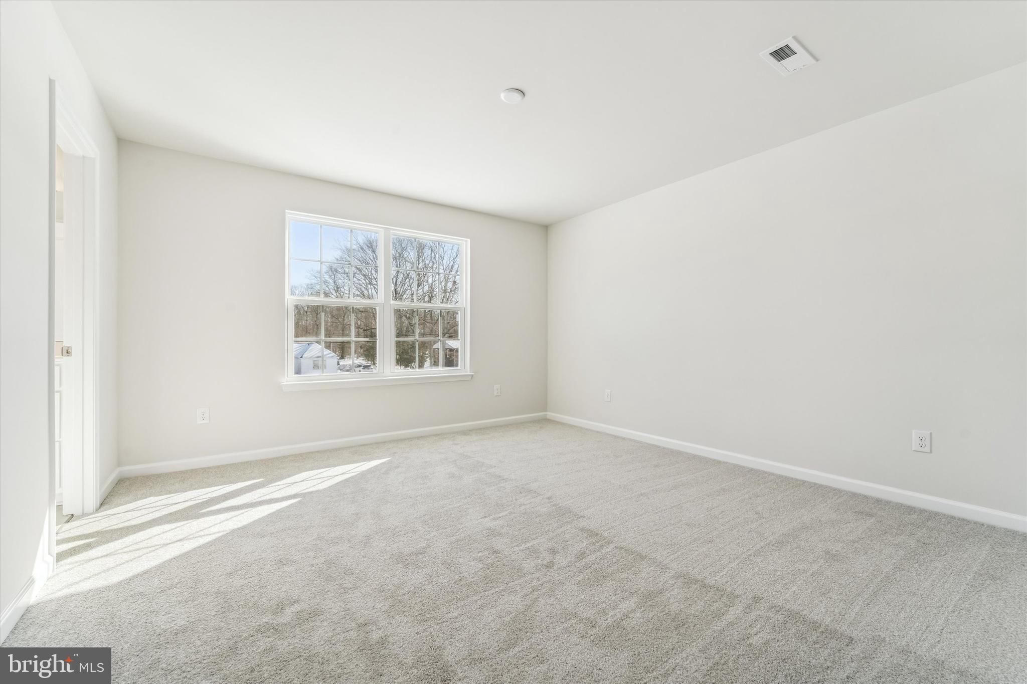 56 Mockernut Road Williamstown, NJ 08094 - Photo 13 of 29 an empty room with windows