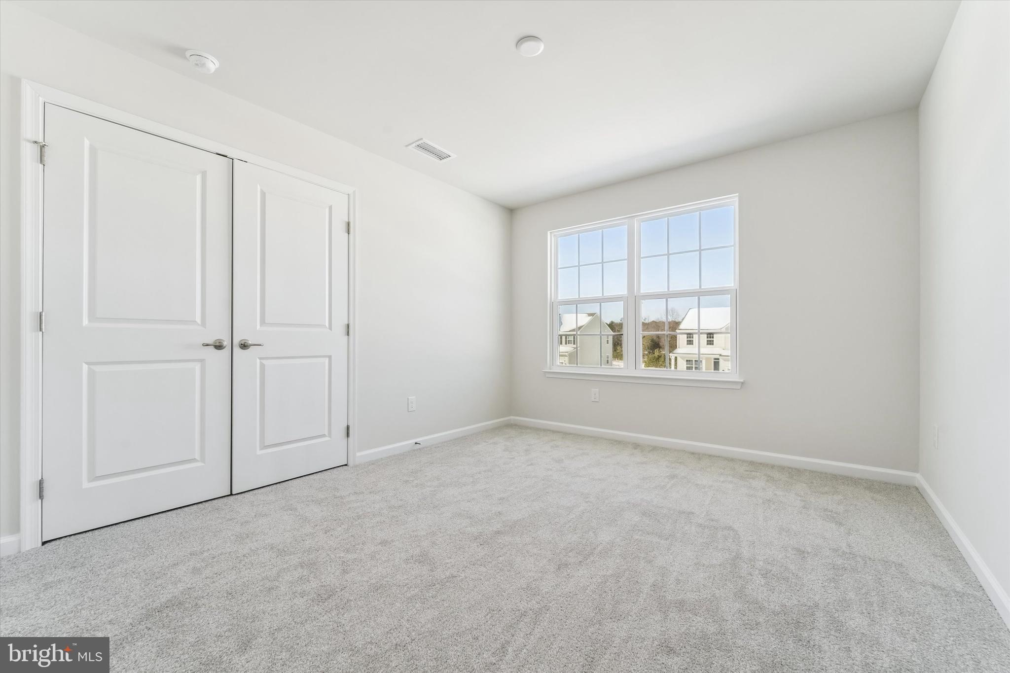56 Mockernut Road Williamstown, NJ 08094 - Photo 21 of 29 an empty room with windows