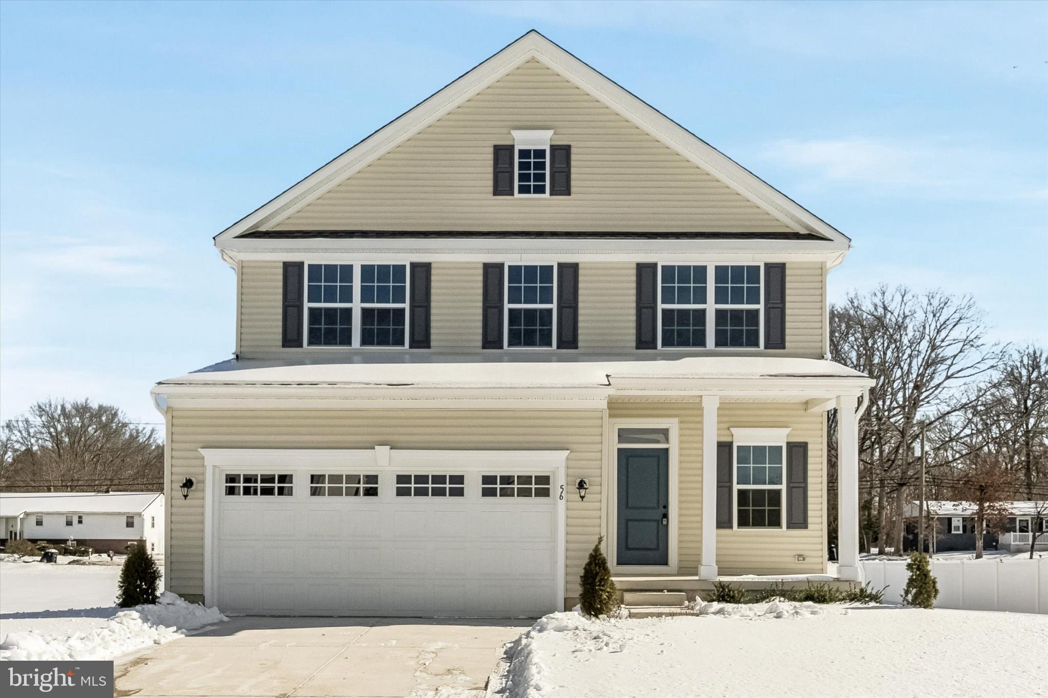 56 Mockernut Road Williamstown, NJ 08094 - Photo 3 of 29 a view of a house with a snow in the background