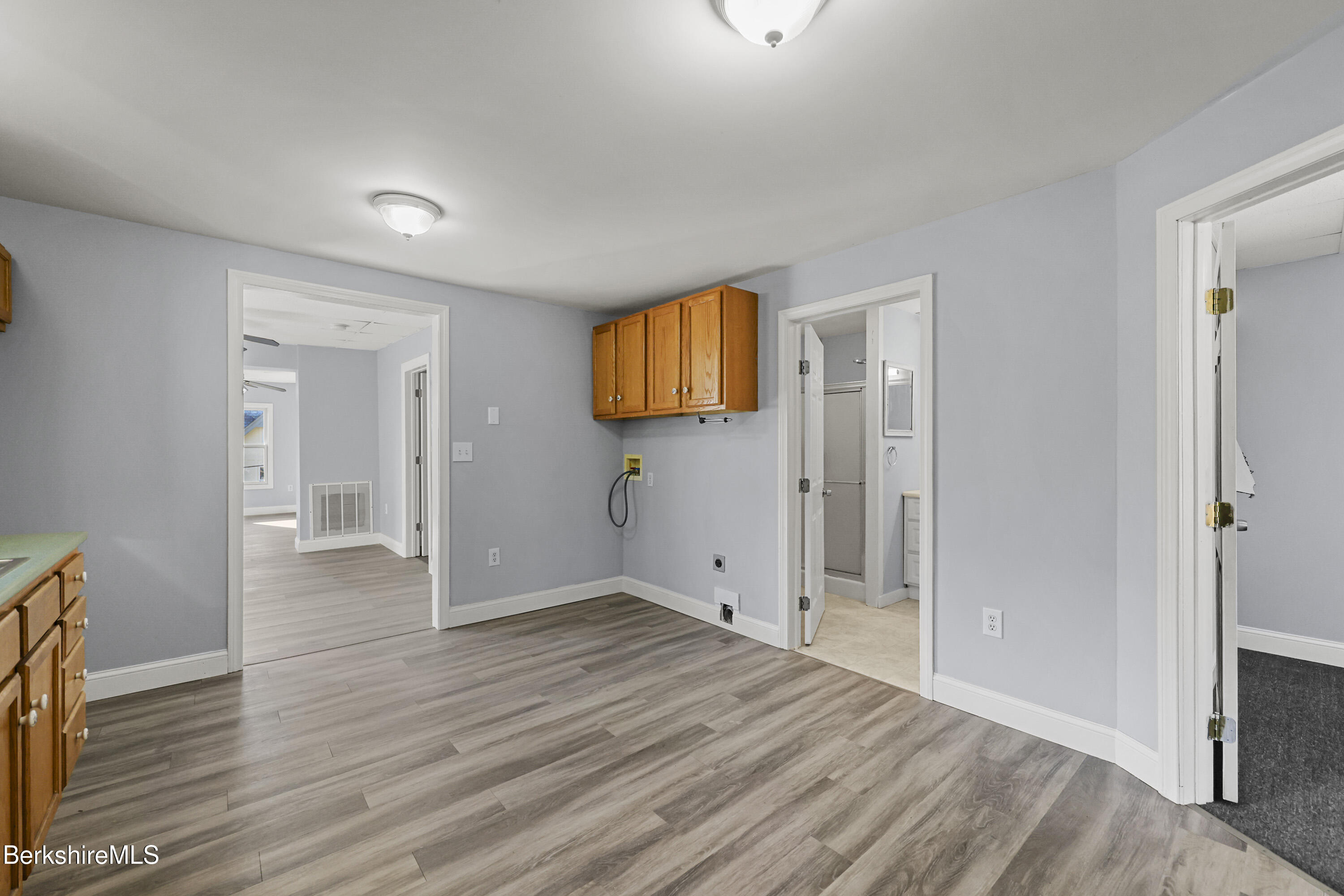 73-75 Hall Street North Adams, MA 01247 - Photo 14 of 32 wooden floor in an empty room with a window
