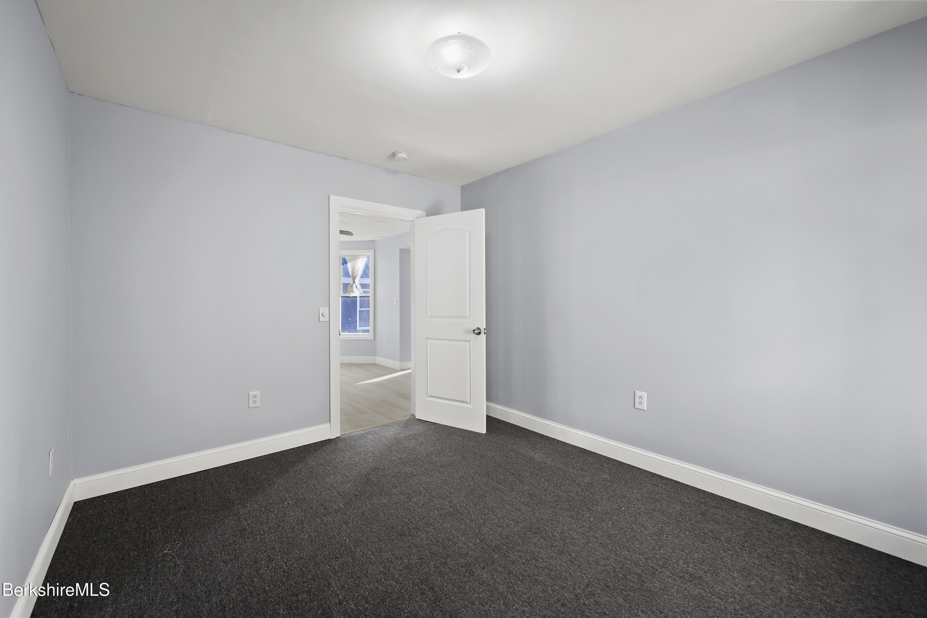 73-75 Hall Street North Adams, MA 01247 - Photo 20 of 32 an empty room with entrance door