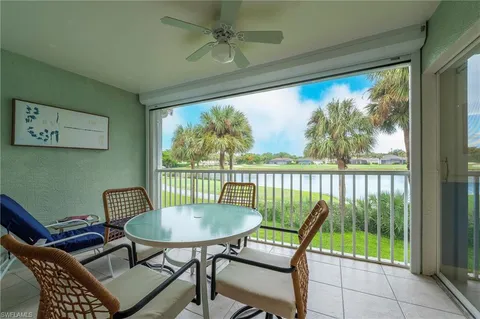 a view of a city from a dining room with furniture window and outside view