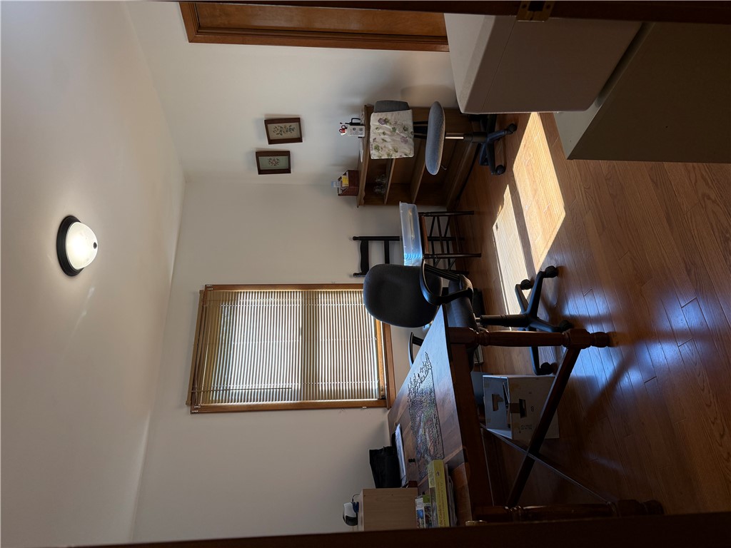 407 Seawright Drive Pendleton, SC 29670 - Photo 17 of 29 Gleaming hardwood floors and a warm wood-trimmed window define this quiet home workspace.