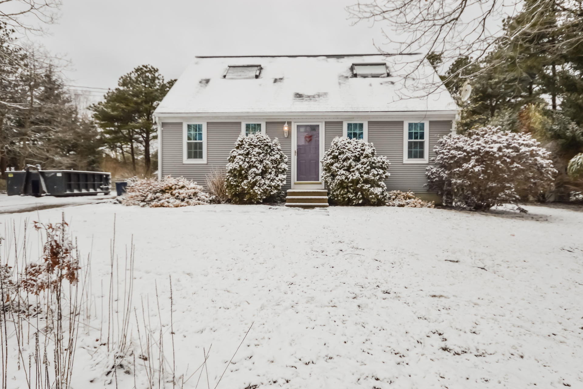 120 Snake Pond Road Forestdale, MA 02644 - Photo 20 of 31 a front view of a house with a yard covered in snow