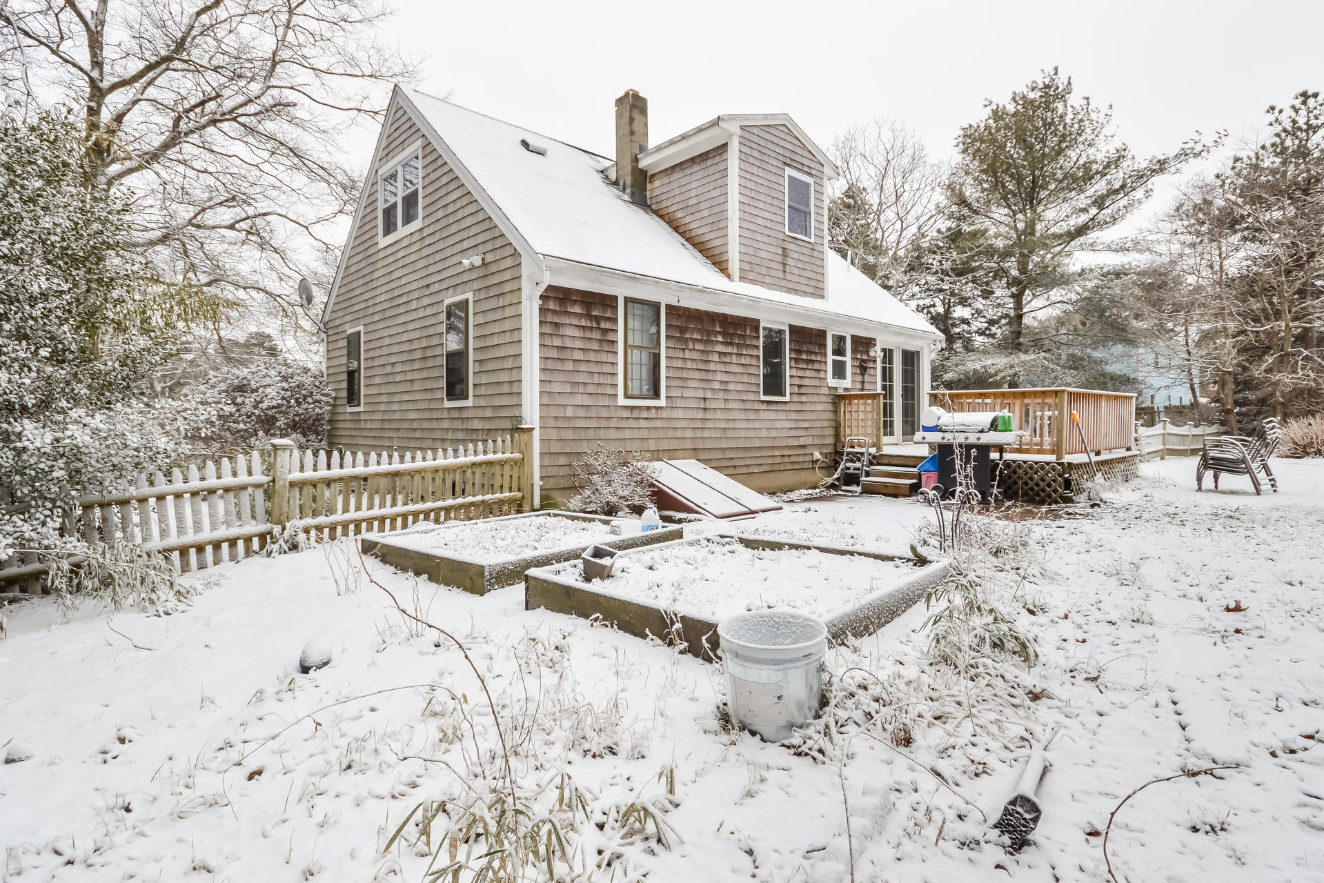 120 Snake Pond Road Forestdale, MA 02644 - Photo 25 of 31 a terrace with a barbeque and wooden fence