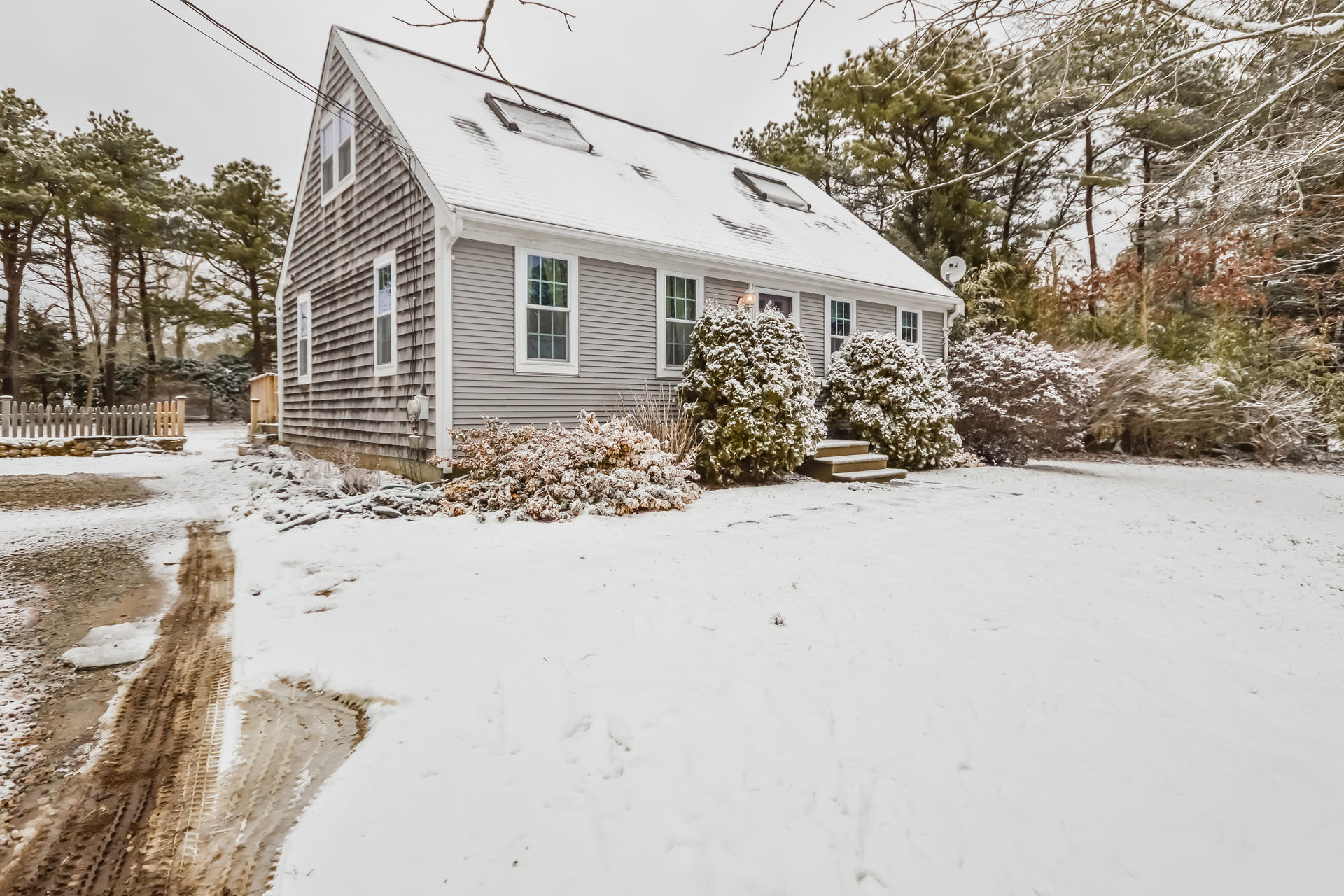 120 Snake Pond Road Forestdale, MA 02644 - Photo 4 of 31 a view of a house with snow on the road