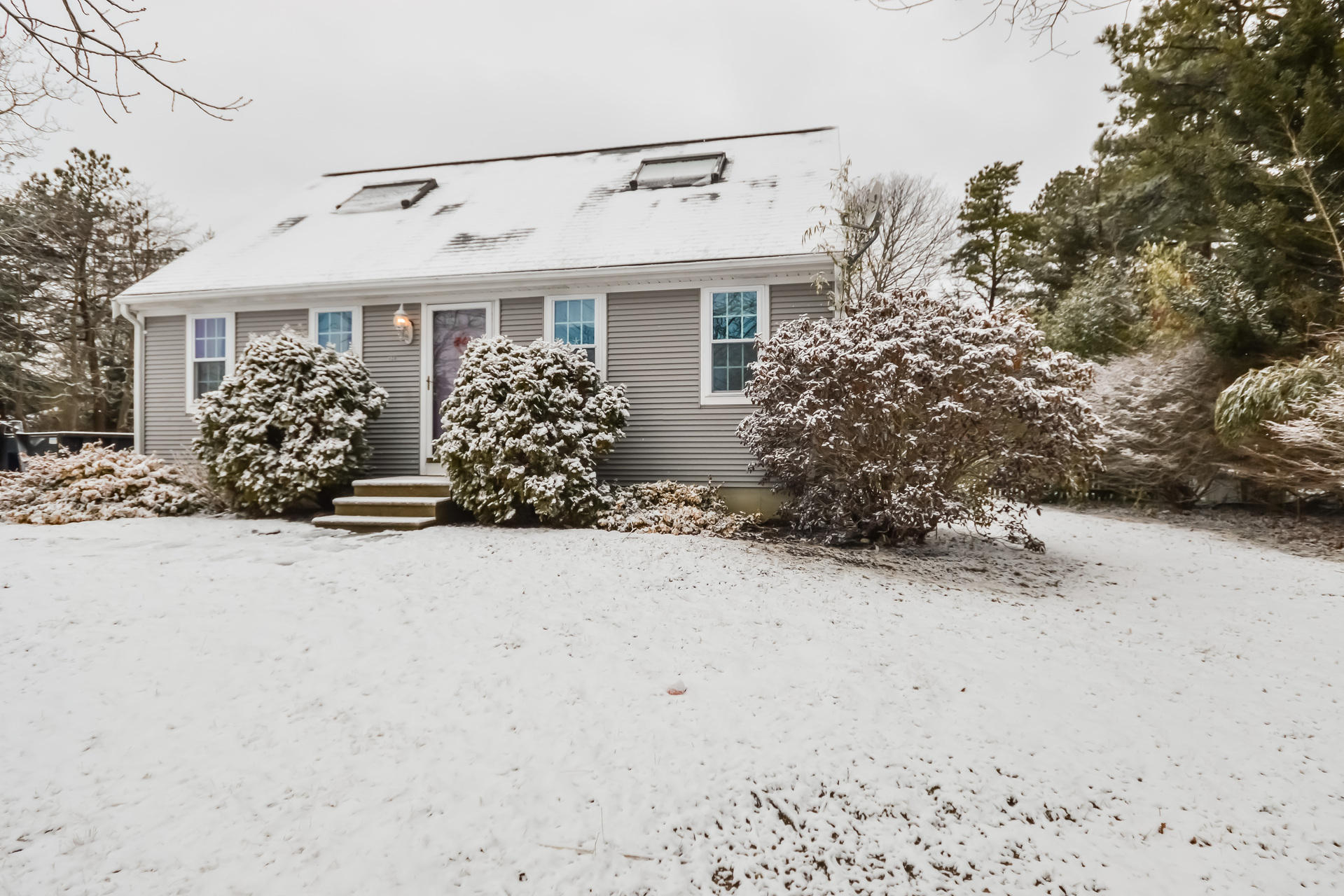 120 Snake Pond Road Forestdale, MA 02644 - Photo 5 of 31 front view of a house with a yard