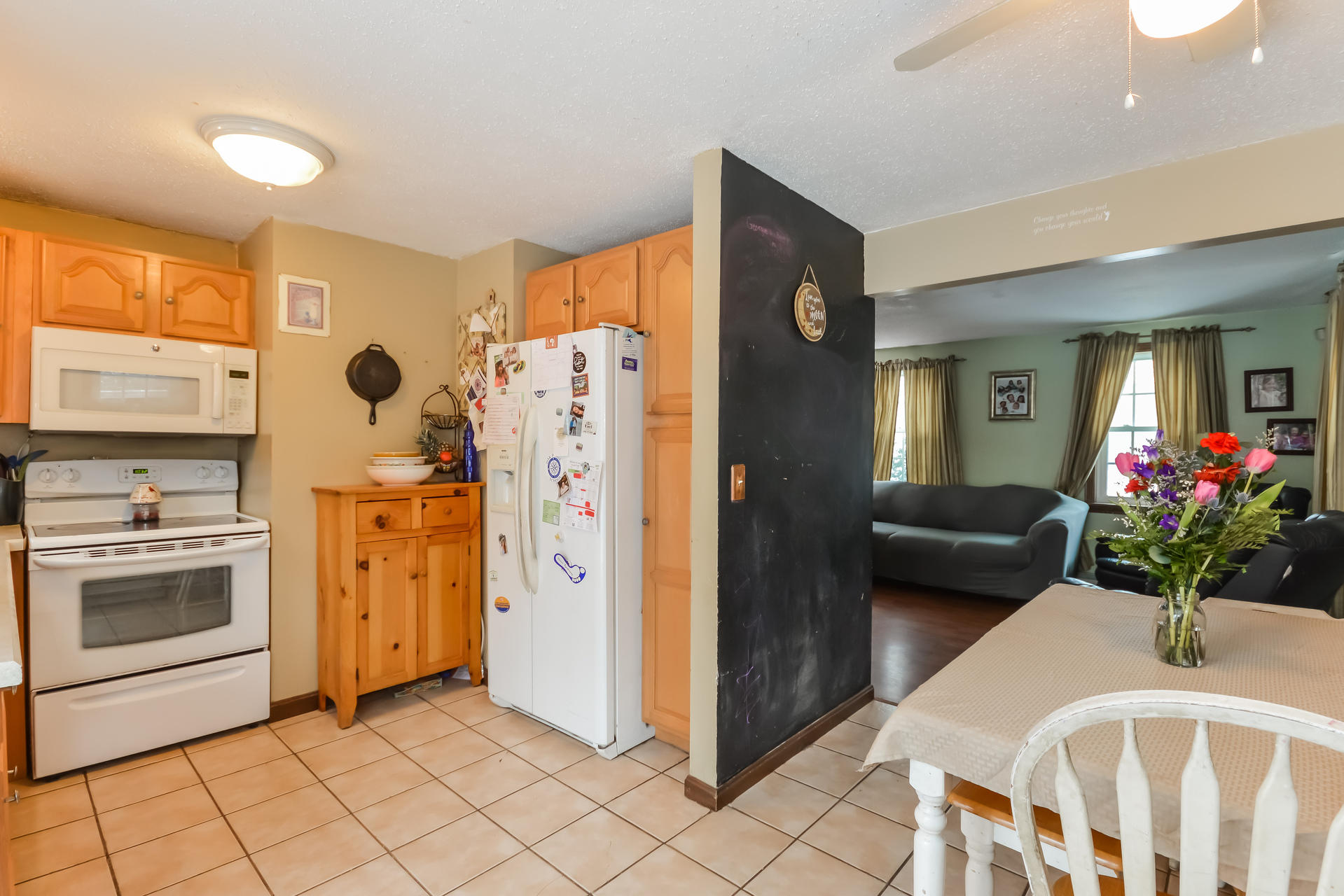 120 Snake Pond Road Forestdale, MA 02644 - Photo 10 of 31 a kitchen with stainless steel appliances a refrigerator sink and cabinets