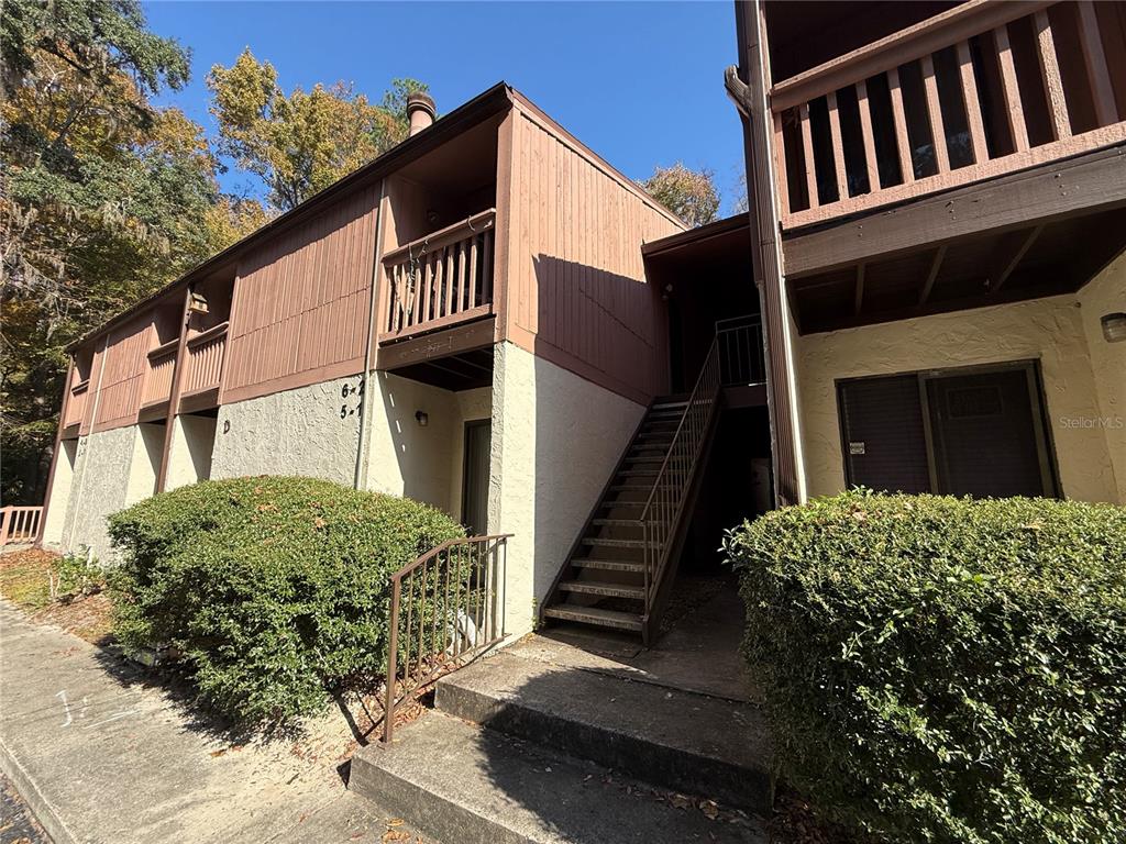 1515 Northwest 29 Road, Unit D2 Gainesville, FL 32605 - Photo 1 of 23 a front view of a house