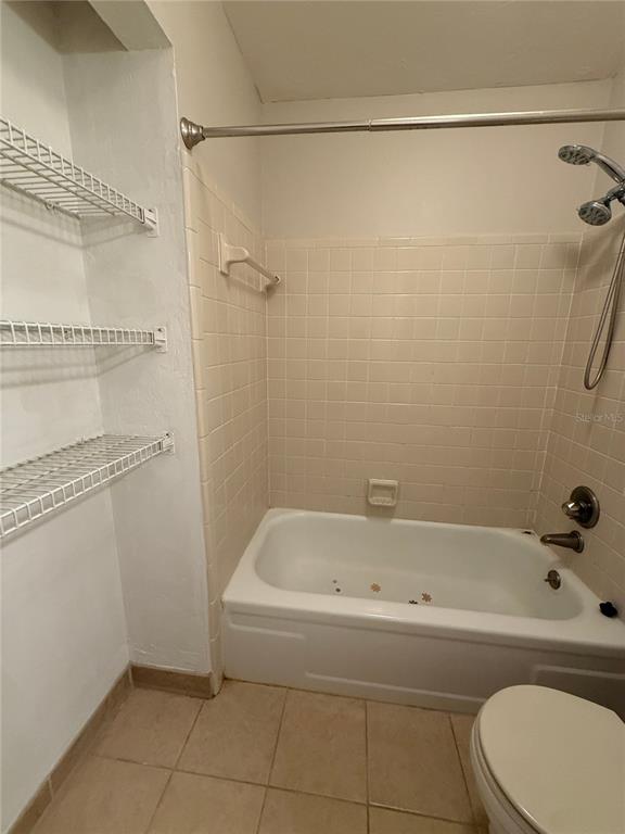 1515 Northwest 29 Road, Unit D2 Gainesville, FL 32605 - Photo 20 of 23 a bathroom with a bathtub and a shower