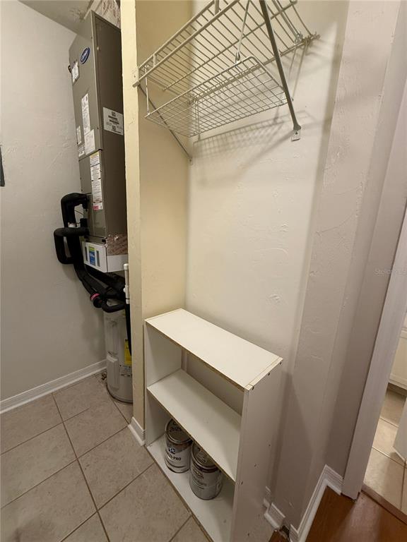 1515 Northwest 29 Road, Unit D2 Gainesville, FL 32605 - Photo 23 of 23 a bathroom with a sink and a mirror