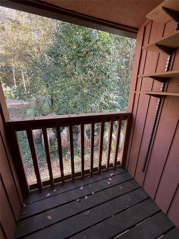 1515 Northwest 29 Road, Unit D2 Gainesville, FL 32605 - Photo 9 of 23 a view of wooden floor