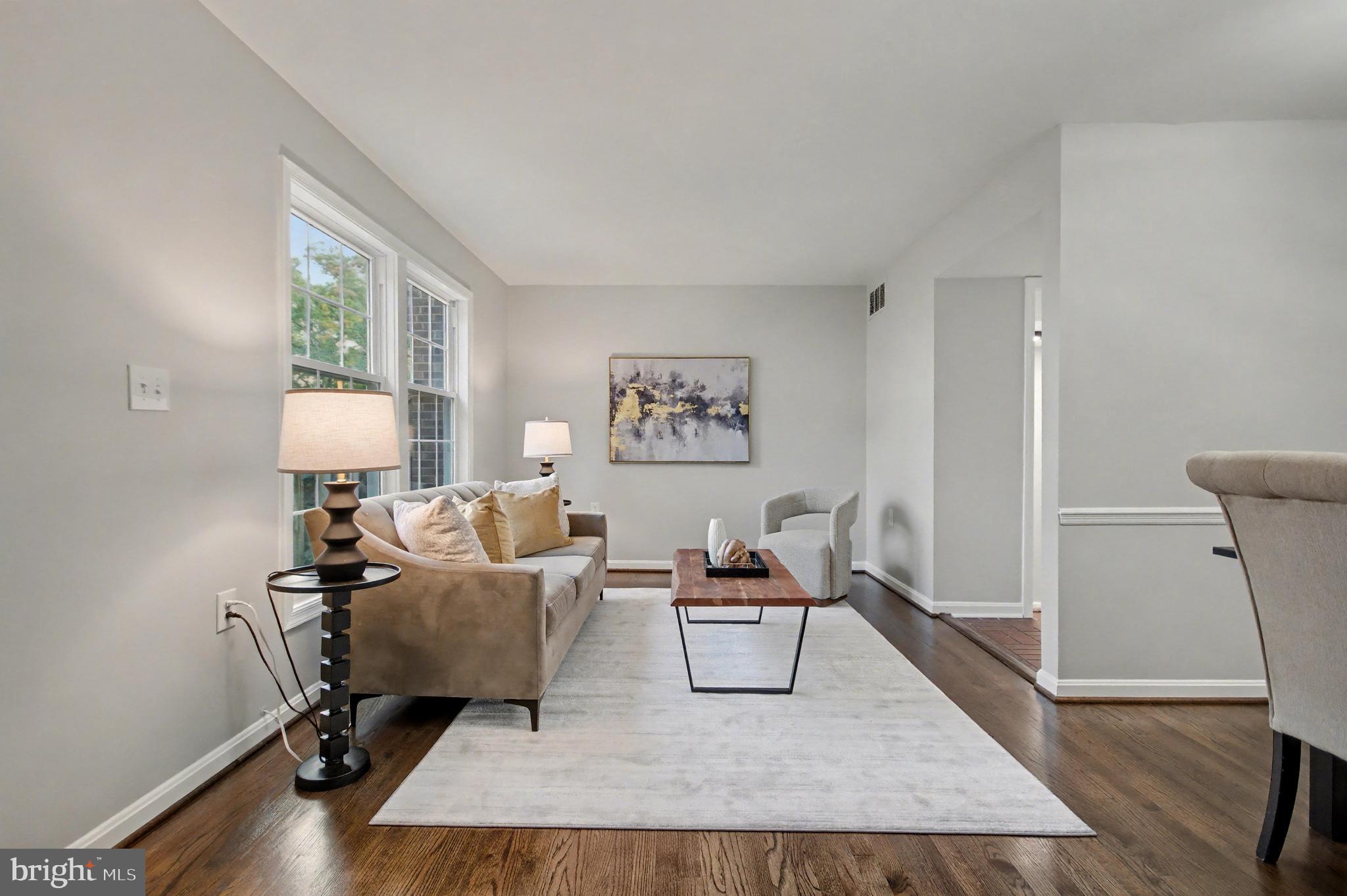 1729 Dana Street, Unit 6 Crofton, MD 21114 - Photo 11 of 33 a living room with furniture and a wooden floor